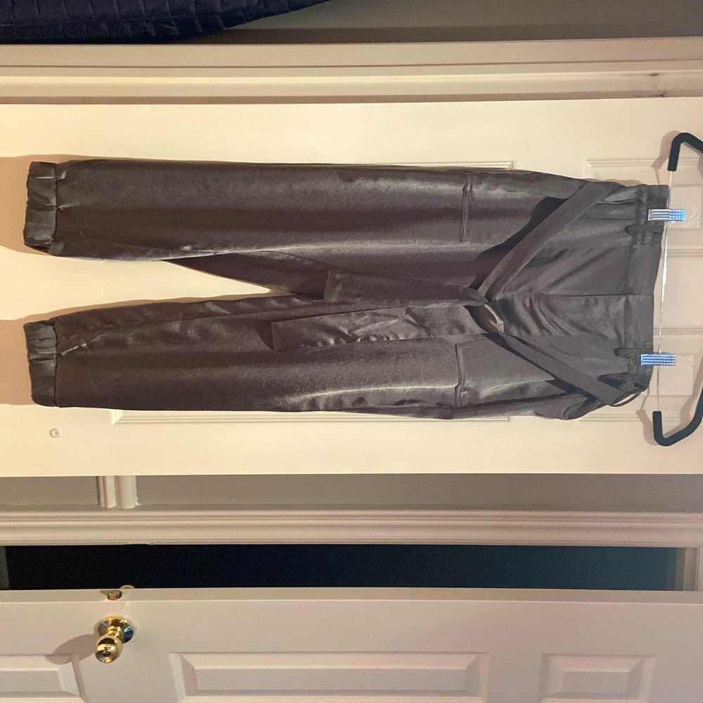 Green slik dress pants with belt. Size 24 women’s. Brand new worn once.